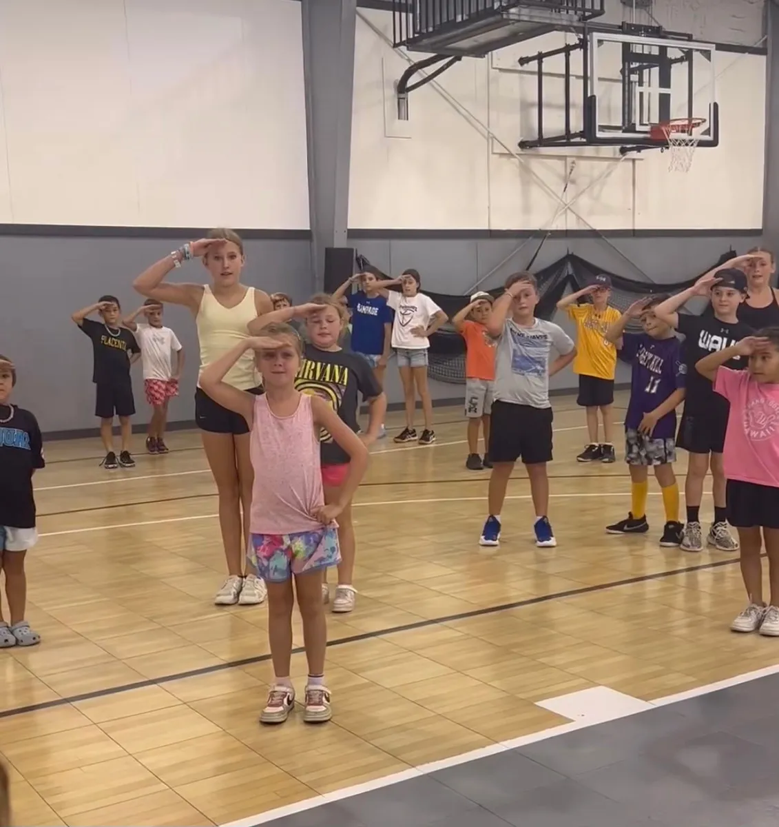 Kids on the Liberty Hill Athletics basketball court at a party